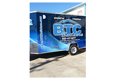 Full trailer wrap designed by Custom Graphics and Signs